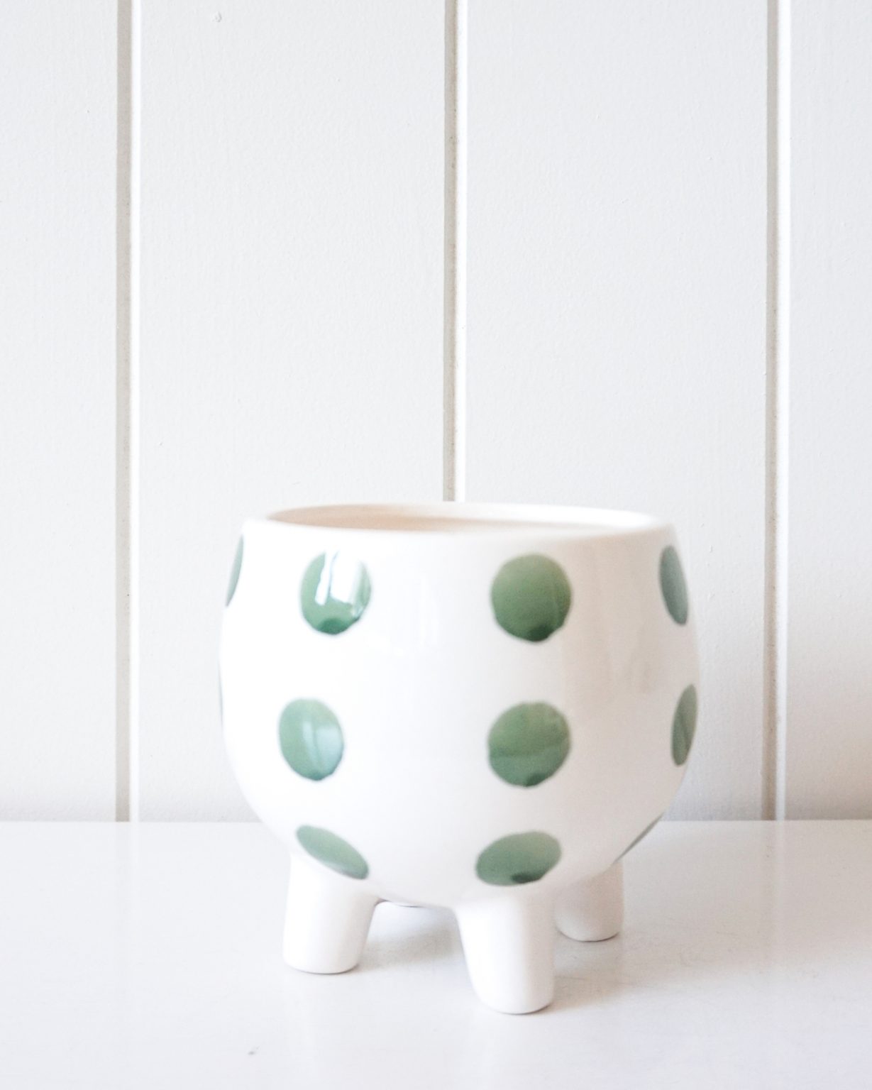 ceramic pot with legs