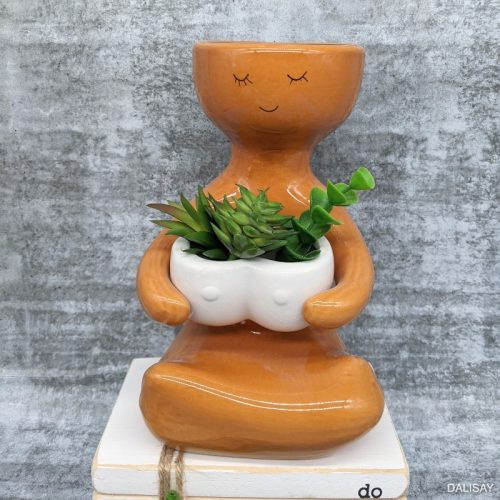 Caramel Sitting Women Holding a Pot Planter