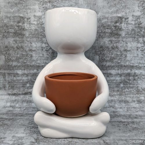 Sitting Person Holding a Pot Planter