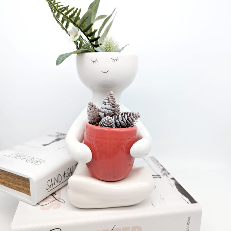 Sitting People Holding A Pot Planter