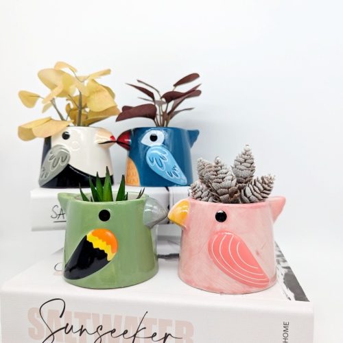 Exhibit your love for greenery in your home or garden with this contemporary style Black Bird Ceramic Planter Pot. Product Features: Features a ceramic planter in shape of a bird Planter has a smooth texture Display some flowers, succulents, herbs, plants or cacti in this pot Product Specification: Material: Ceramic Size: Length - 10.2 centimetres, Width - 8.5 centimetres, Height - 6.8 centimetres Colors: Black (As Pictured) Features: Drainage hole and stopper Please note that this listing is for a single planter. Accessories and Plants shown are only for display purpose.