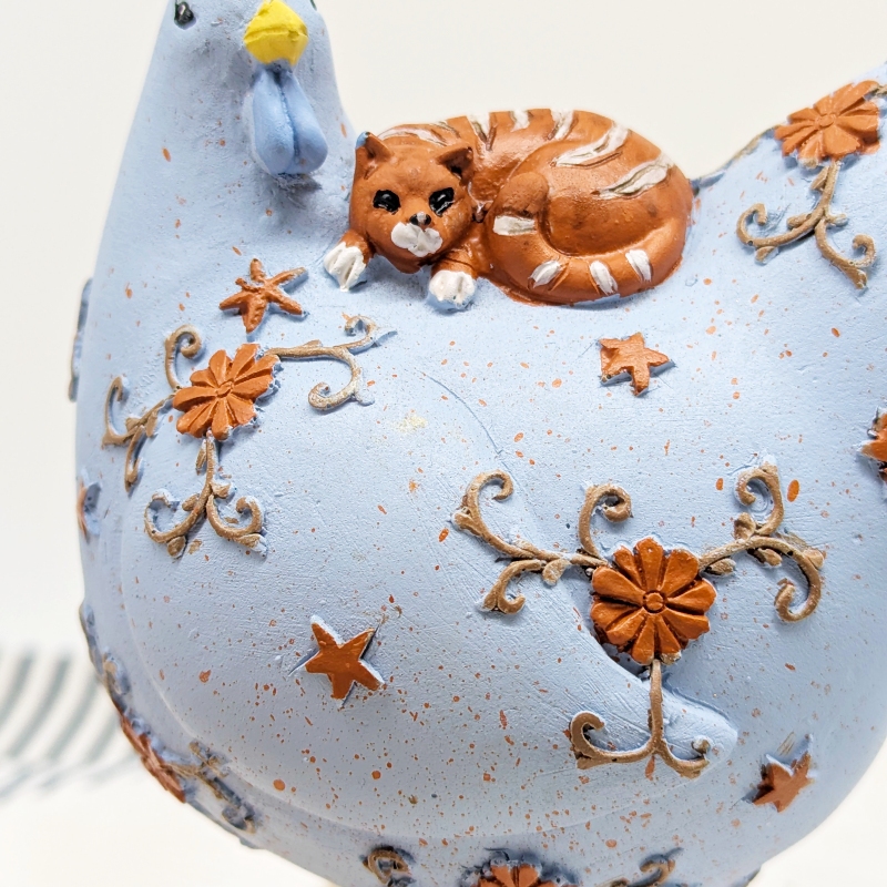 PXL_20251105_235749226 Purrfect Cat on Chicken Figurine