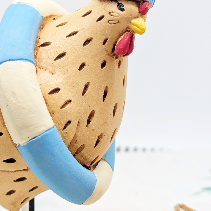 PXL_20251106_000428163 Swimming Lifeguard Chicken Figurine