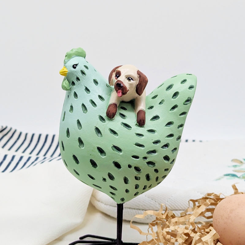 PXL_20251106_001305341 Hanging Dog Chicken Figurine