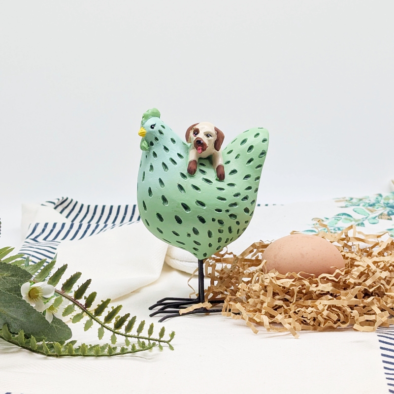 PXL_20251106_001404417 Hanging Dog Chicken Figurine