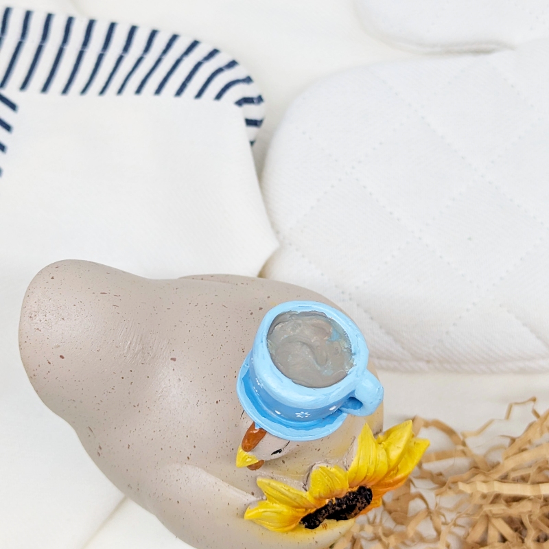 PXL_20251106_001527956 Cup of Sunshine Chicken Figurine