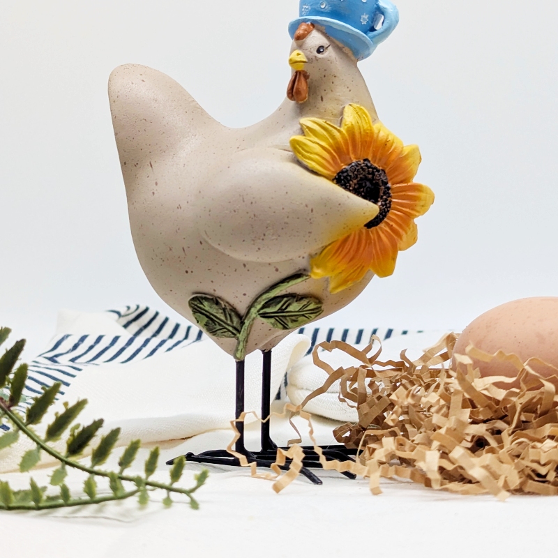 PXL_20251106_001615185 Cup of Sunshine Chicken Figurine