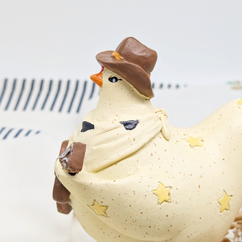 PXL_20251106_001759109 Musical Cowboy Chicken Figurine